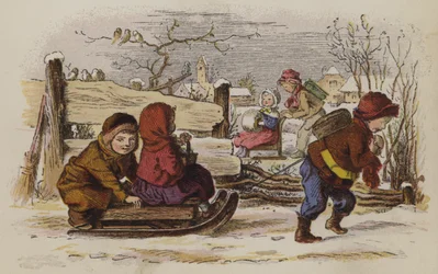 Niños jugando con un trineo en la nieve